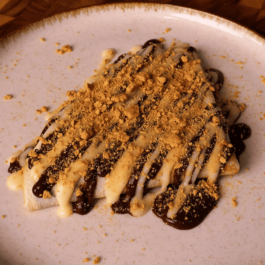 Chocolate Crepes with Strawberries and Biscuit